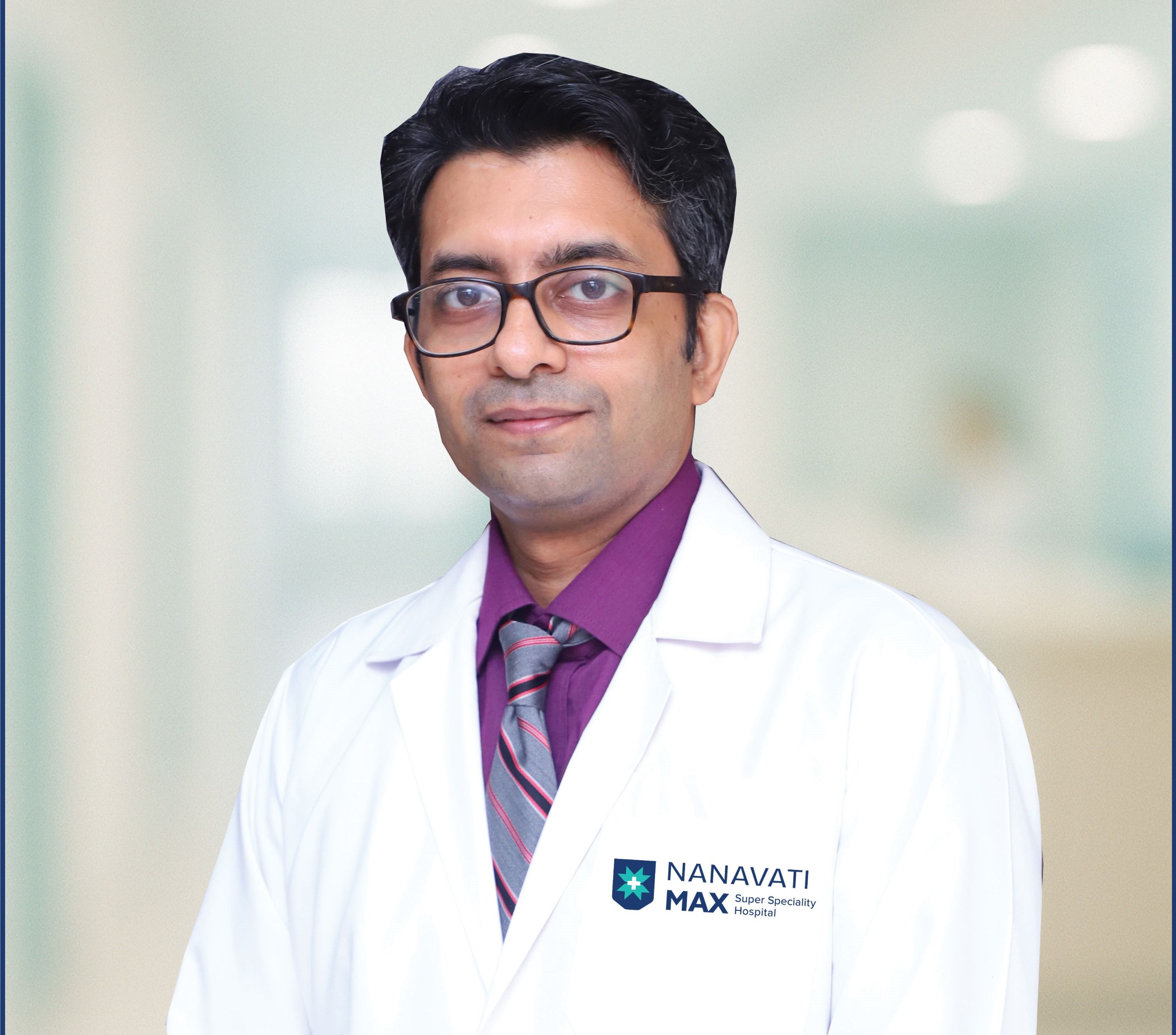 Dr. Mihir S. Raut