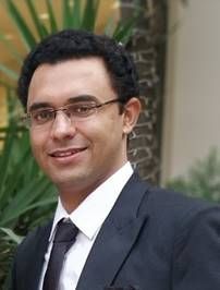 Dr. Amrit Kapoor