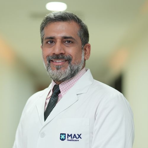 Dr. Praveen Kumar - Senior Director - Department of Dental Surgery & Implantology -  