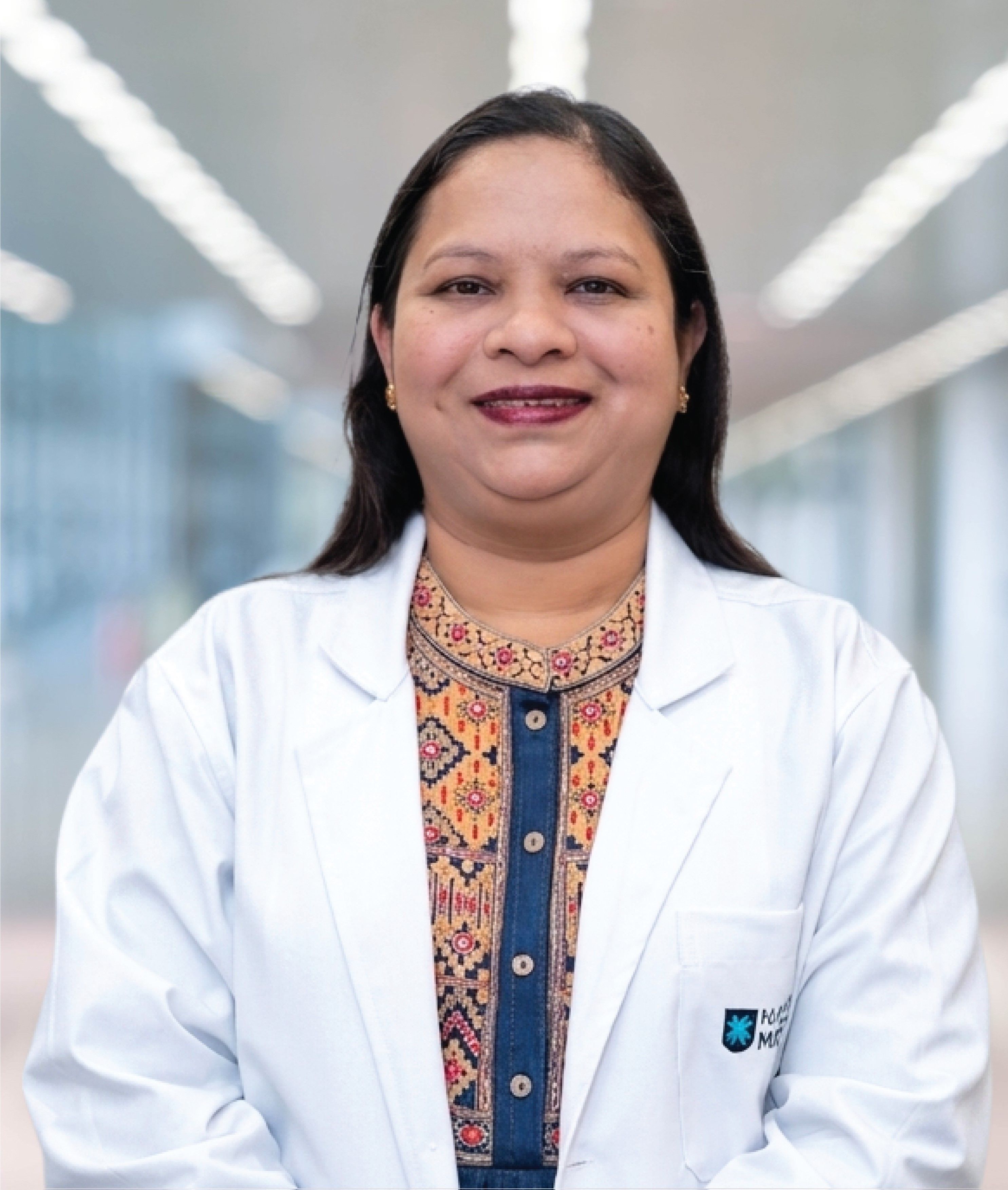 Dr Rakhi Dhotre